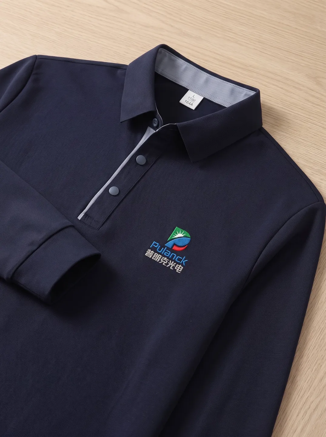 Navy Long-Sleeve Polo Shirt · Logo and design details · PM-C-008 / 3