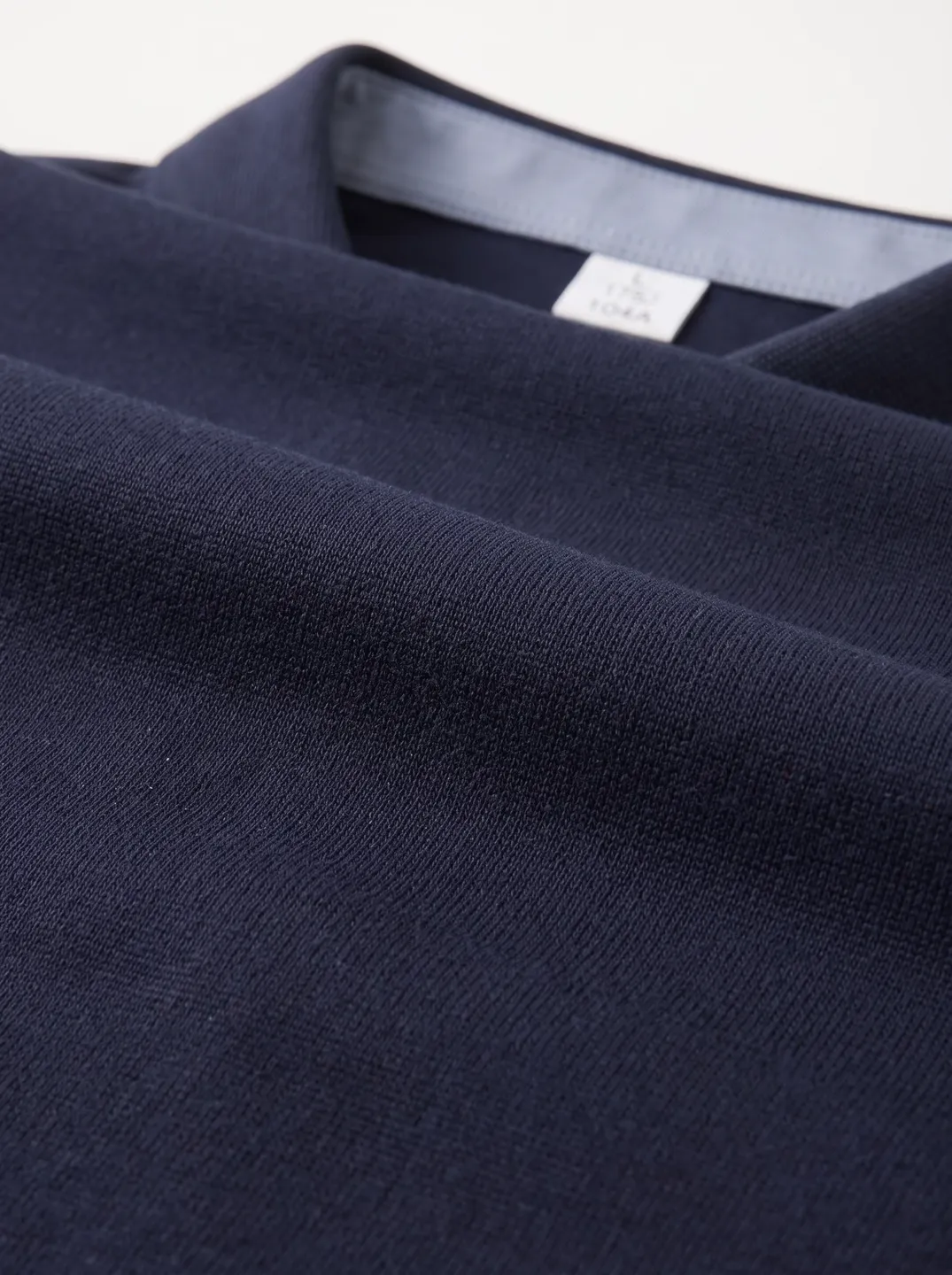 Navy Long-Sleeve Polo Shirt · Logo and design details · PM-C-008 / 4