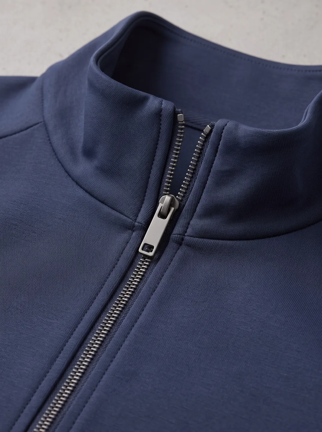 Navy Stand-Collar Zip Jacket · Logo and design details · PM-C-010 / 3