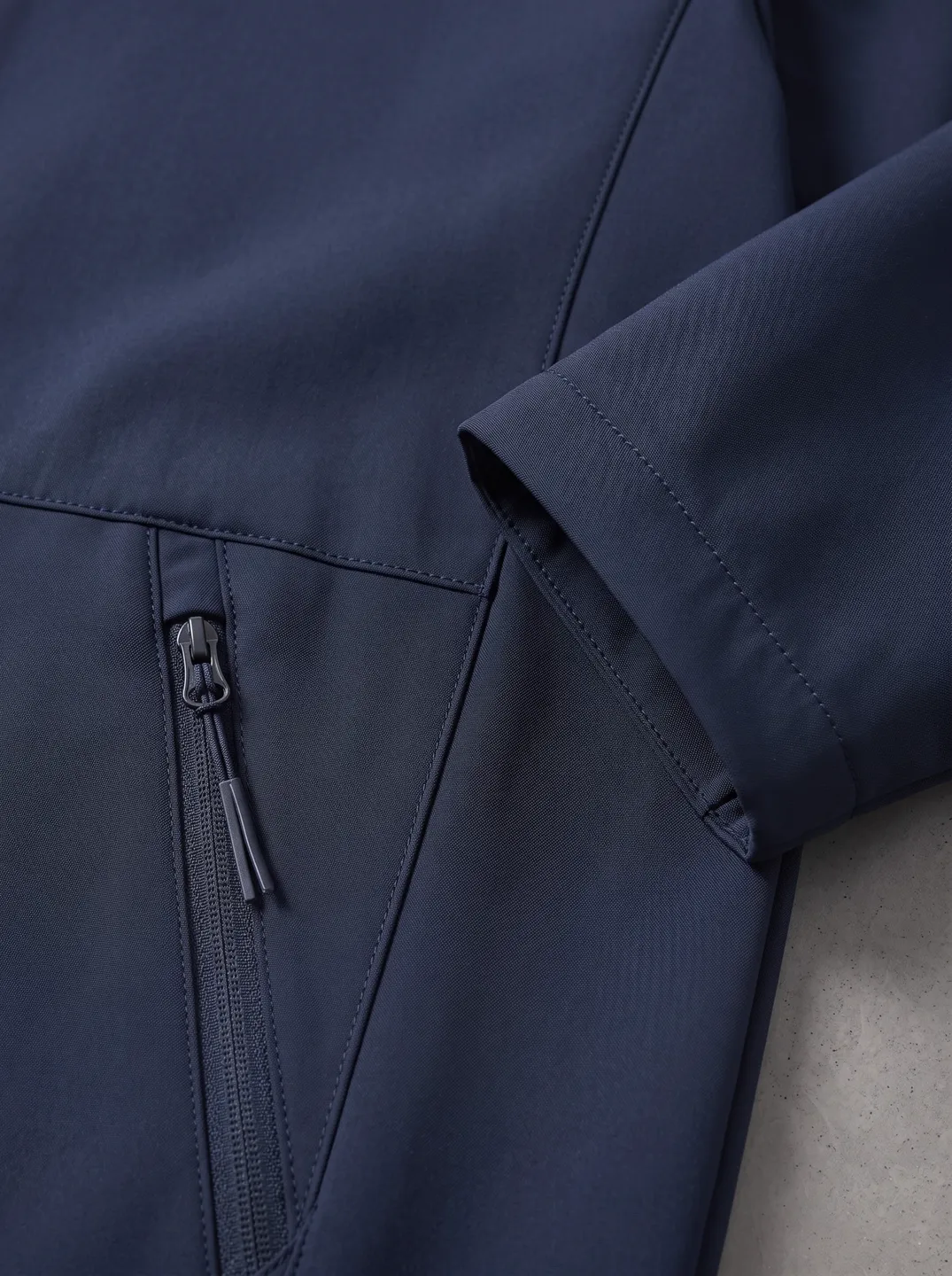 Navy Stand-Collar Zip Jacket · Logo and design details · PM-C-014 / 4
