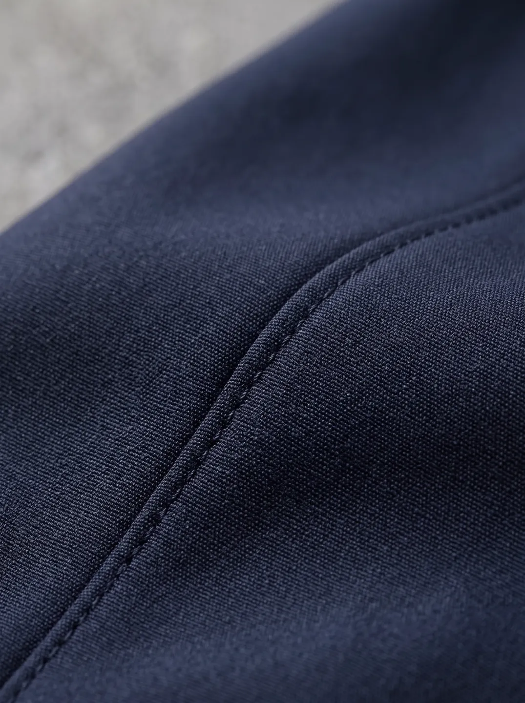 Navy Stand-Collar Zip Jacket · Logo and design details · PM-C-014 / 5