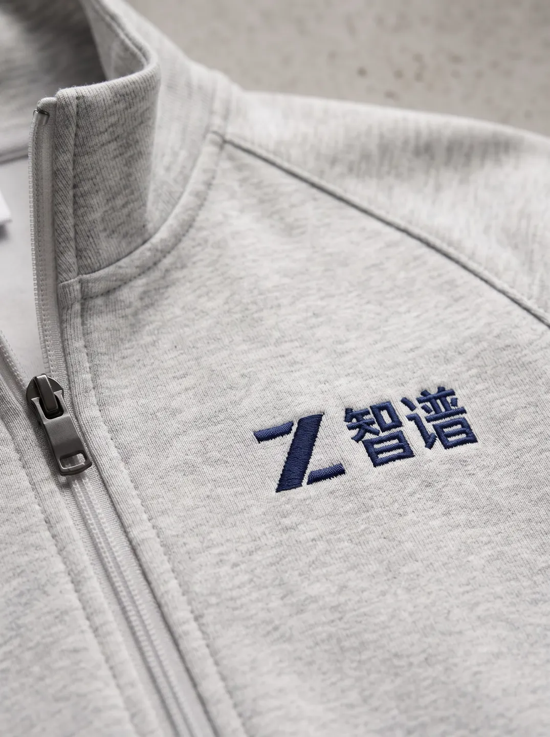 Light Grey Stand-Collar Zip Jacket · Logo and design details · PM-C-018 / 4
