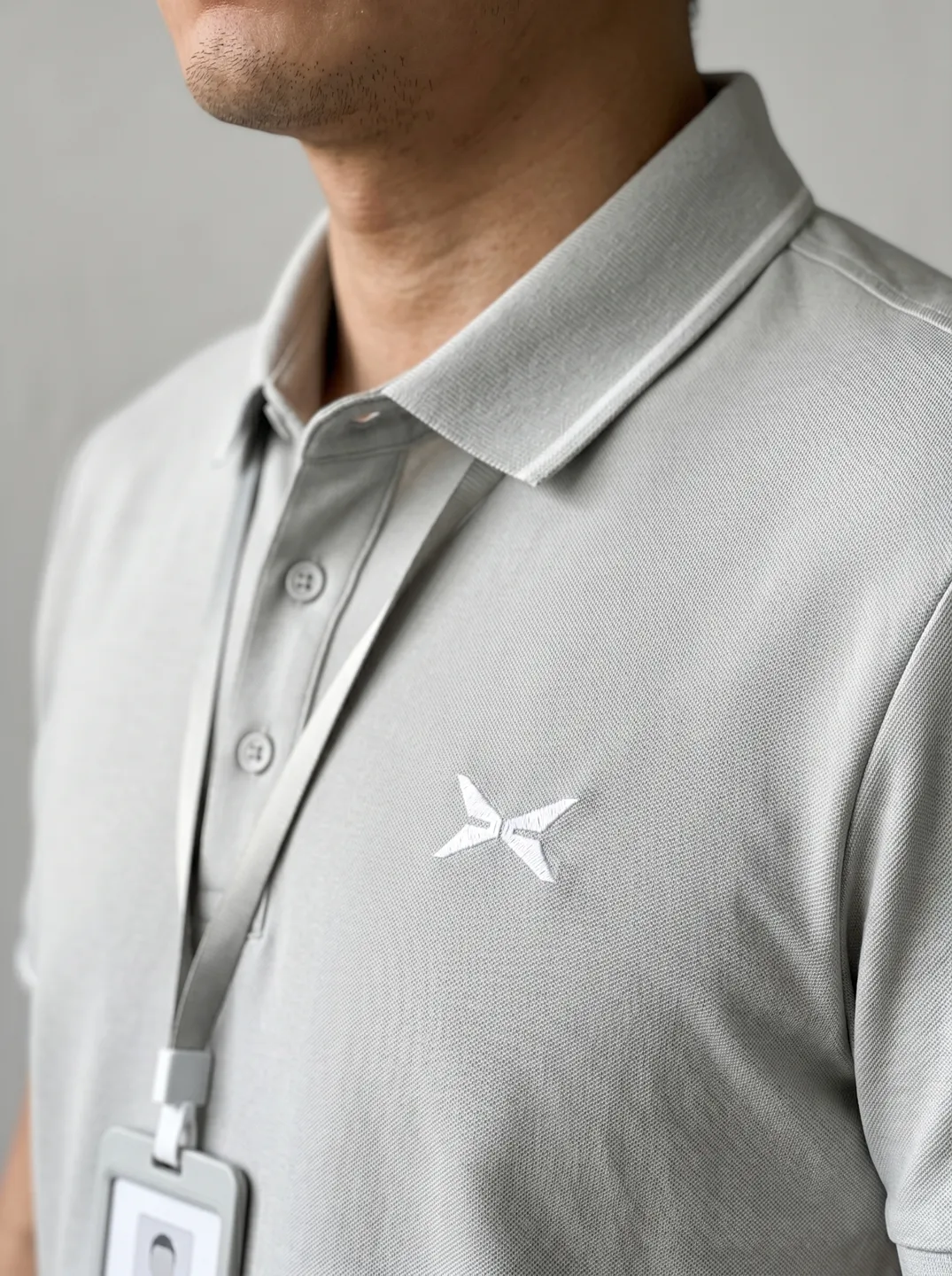 Light Grey Polo Shirt · Logo and design details · PM-C-054 / 2