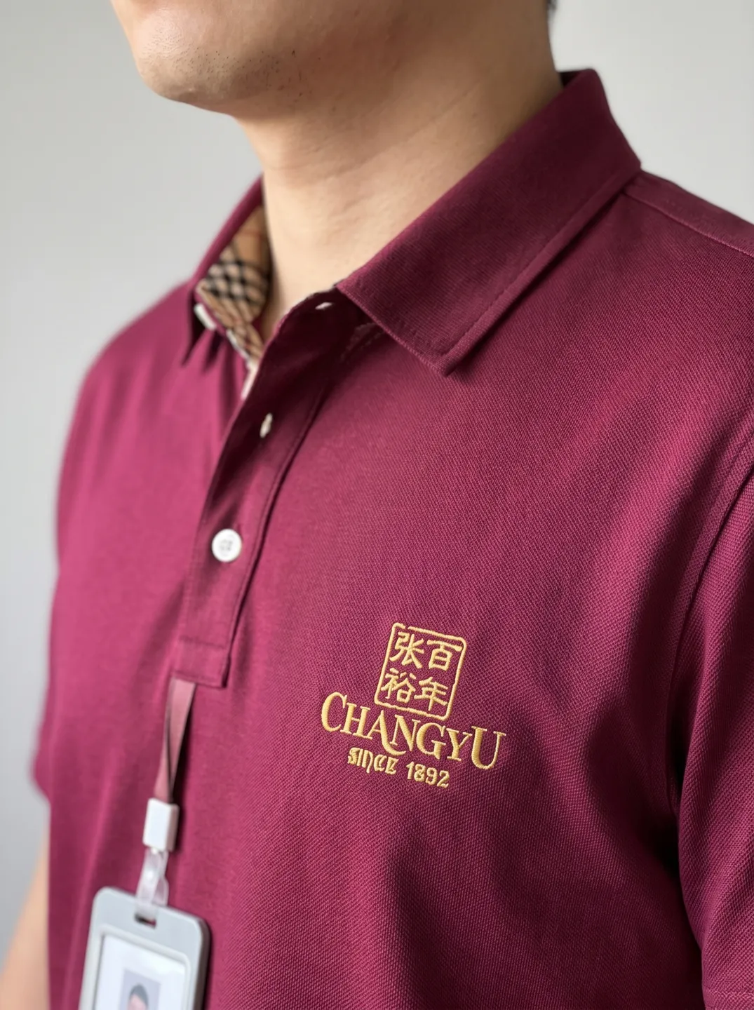 Burgundy Polo Shirt · Logo and design details · PM-C-065 / 3