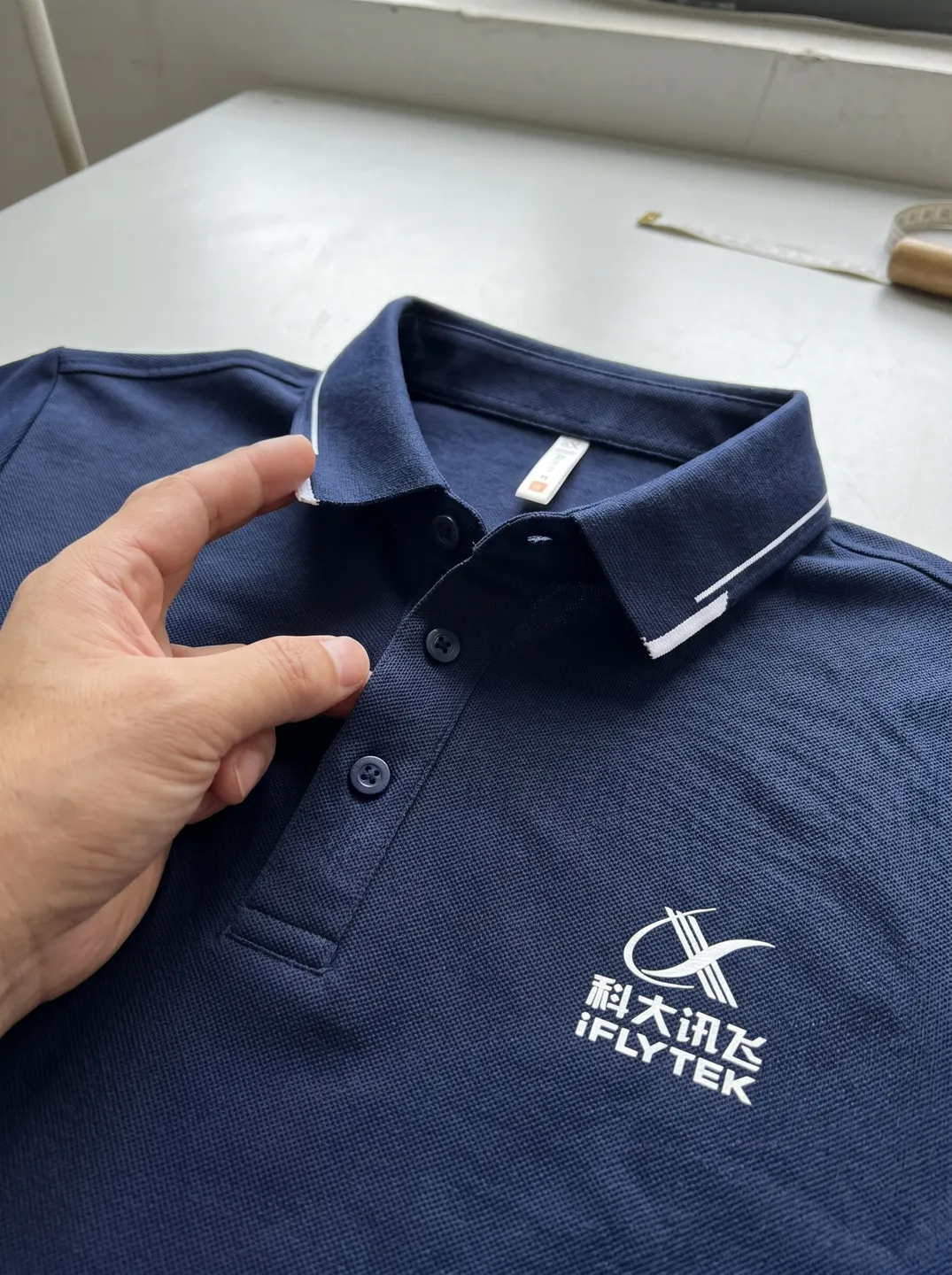 Navy Polo Shirt · Logo and design details · PM-C-067 / 3