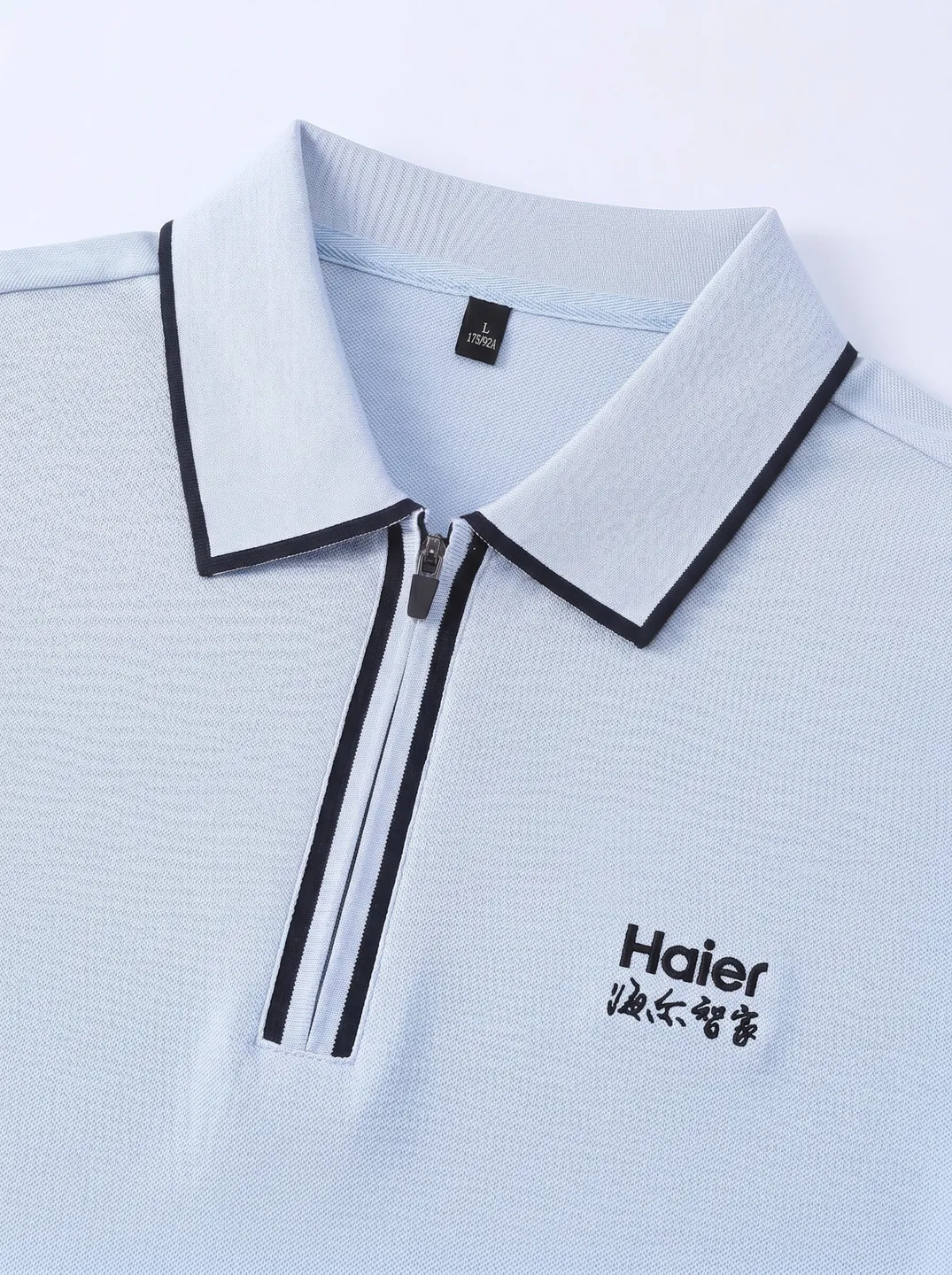 Light Blue Zip-Neck Polo Shirt · Logo and design details · PM-C-069 / 3