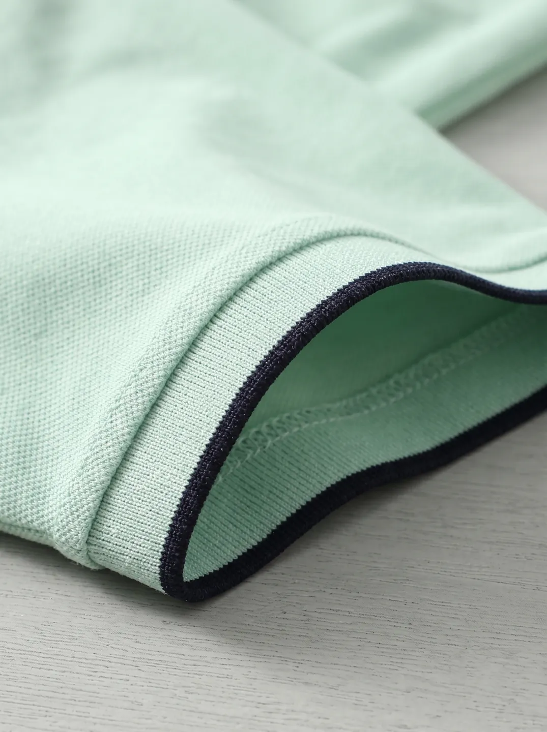 Mint Polo Shirt · Logo and design details · PM-C-073 / 5
