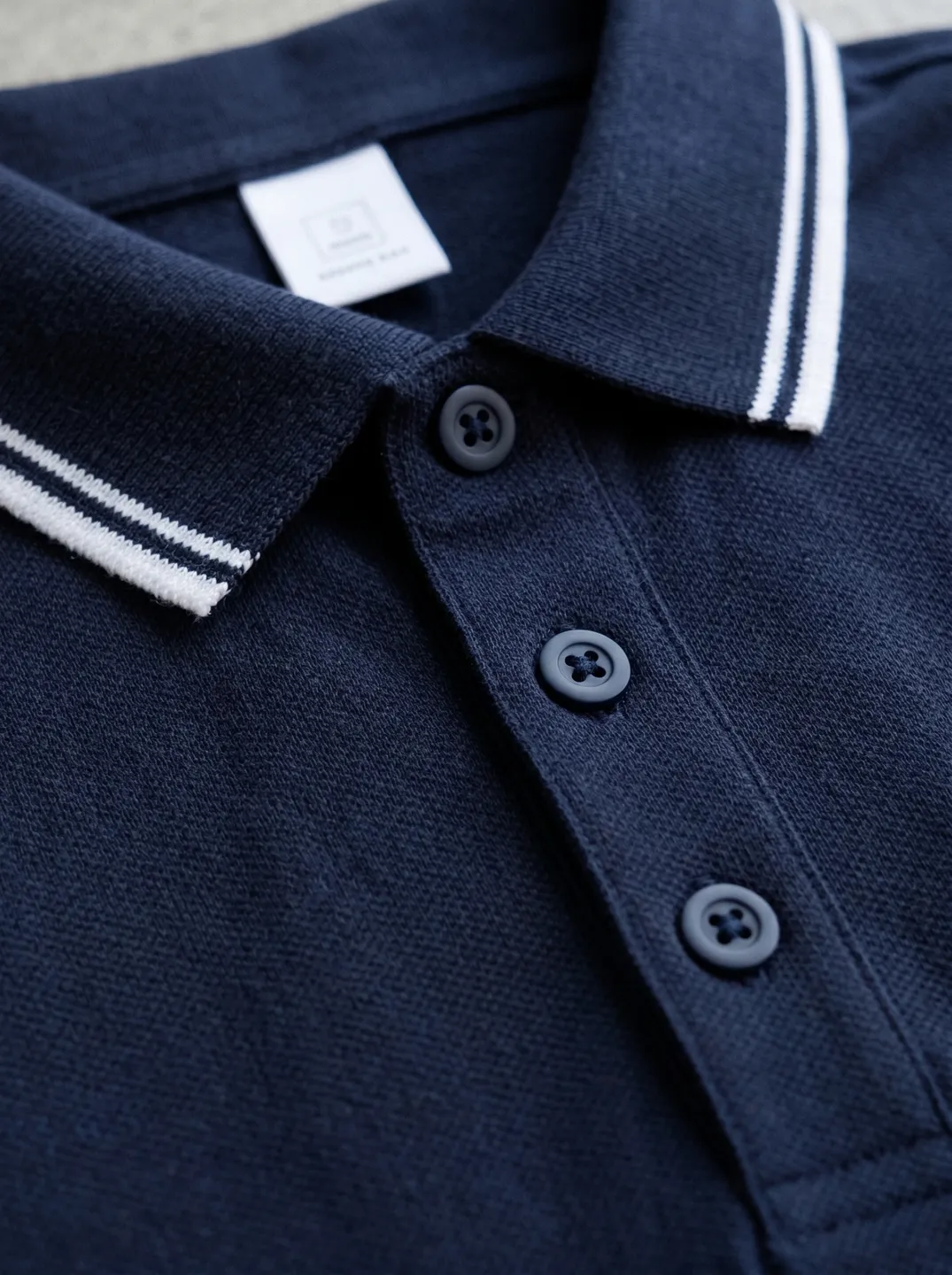 Navy Polo Shirt · Logo and design details · PM-C-075 / 4