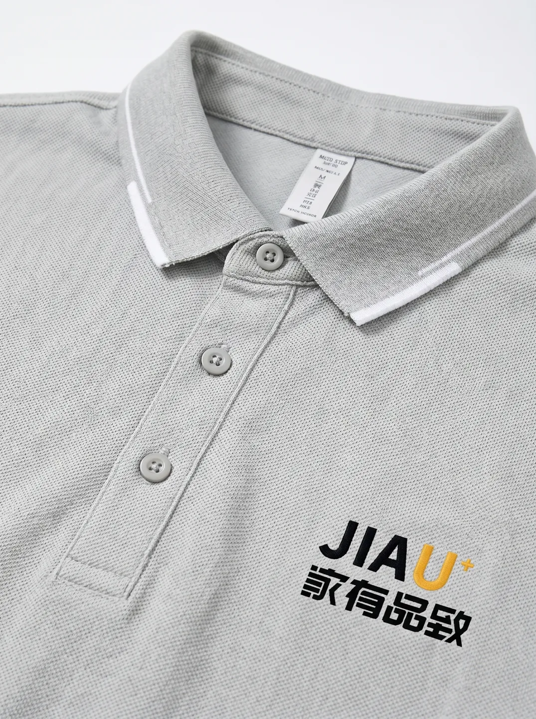 Light Grey Polo Shirt · Logo and design details · PM-C-077 / 3