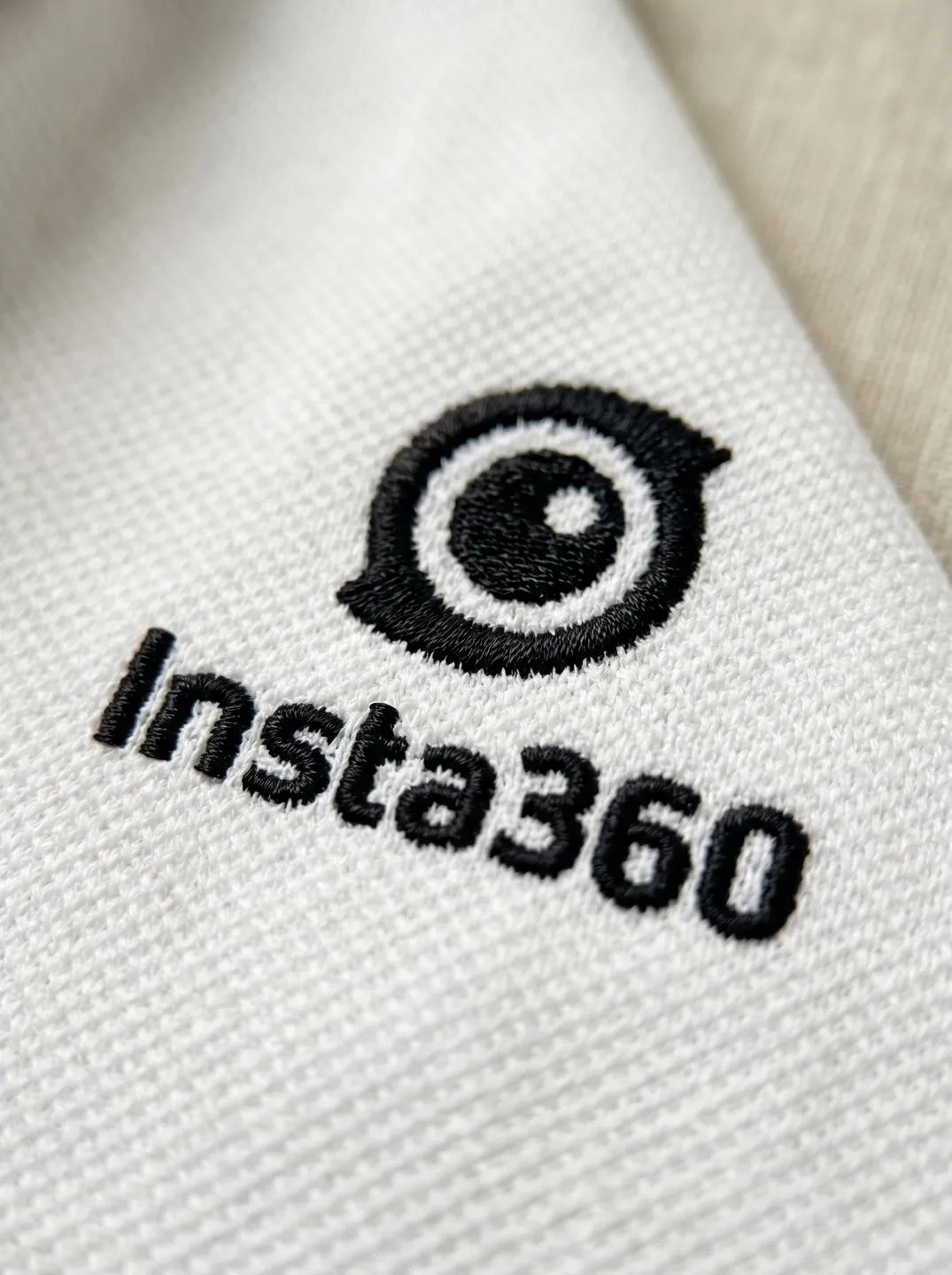 White Zip-Neck Polo Shirt · Logo and design details · PM-C-078 / 2