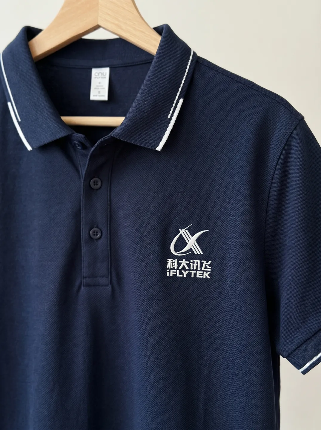 Navy Polo Shirt · Logo and design details · PM-C-080 / 3