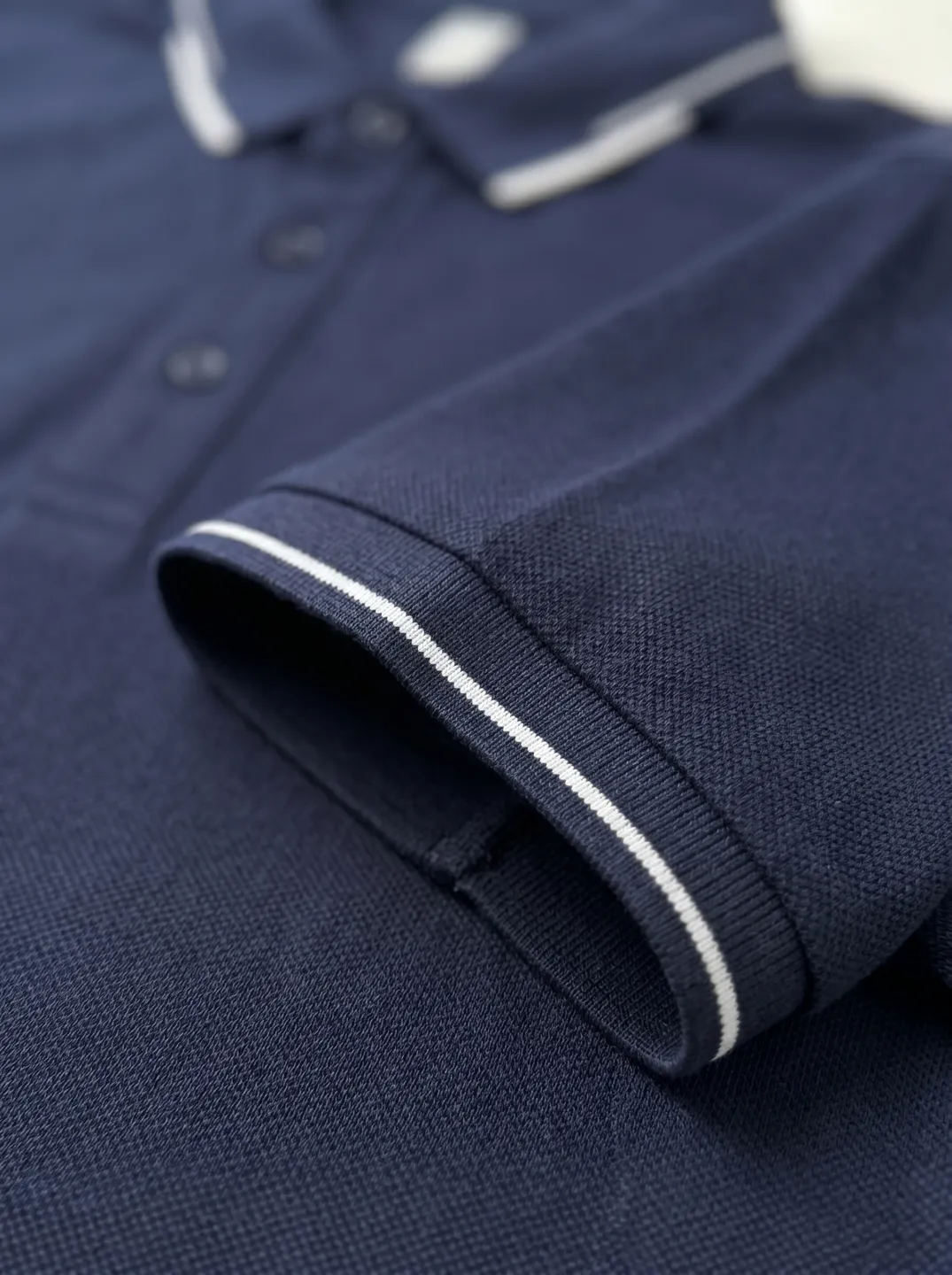 Navy Polo Shirt · Logo and design details · PM-C-080 / 4