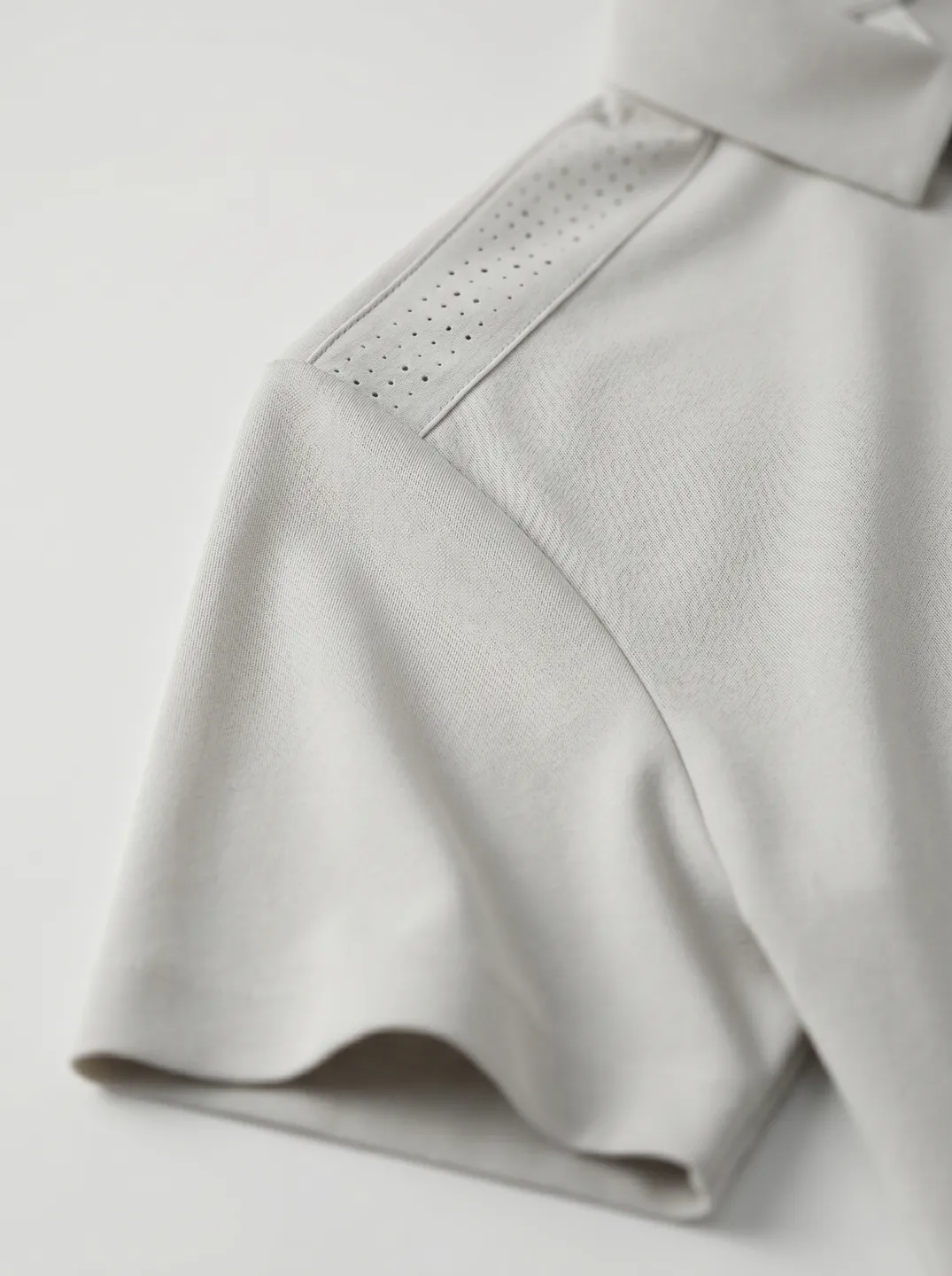 Beige Polo Shirt · Logo and design details · PM-C-082 / 5