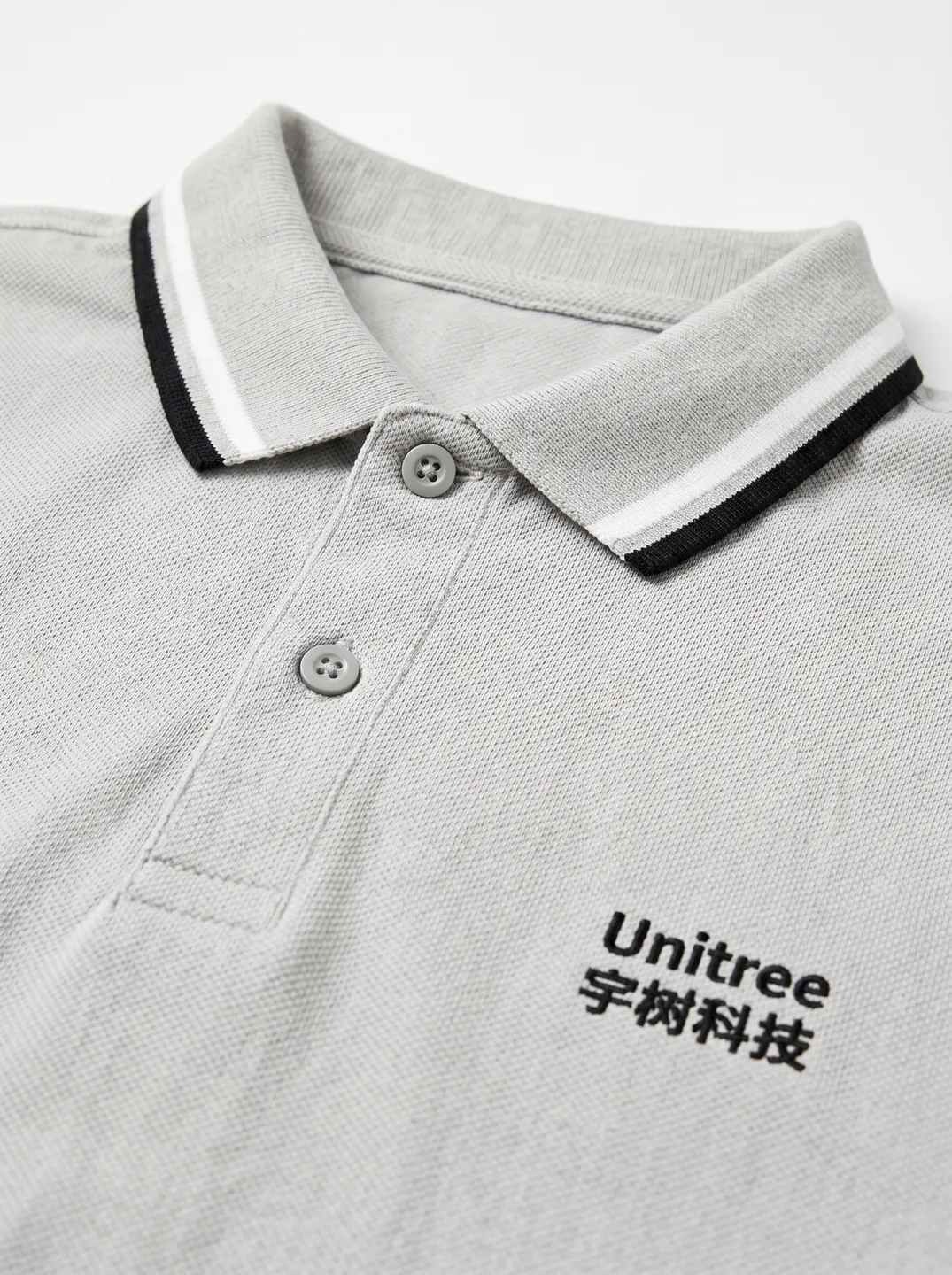 Light Grey Polo Shirt · Logo and design details · PM-C-088 / 5