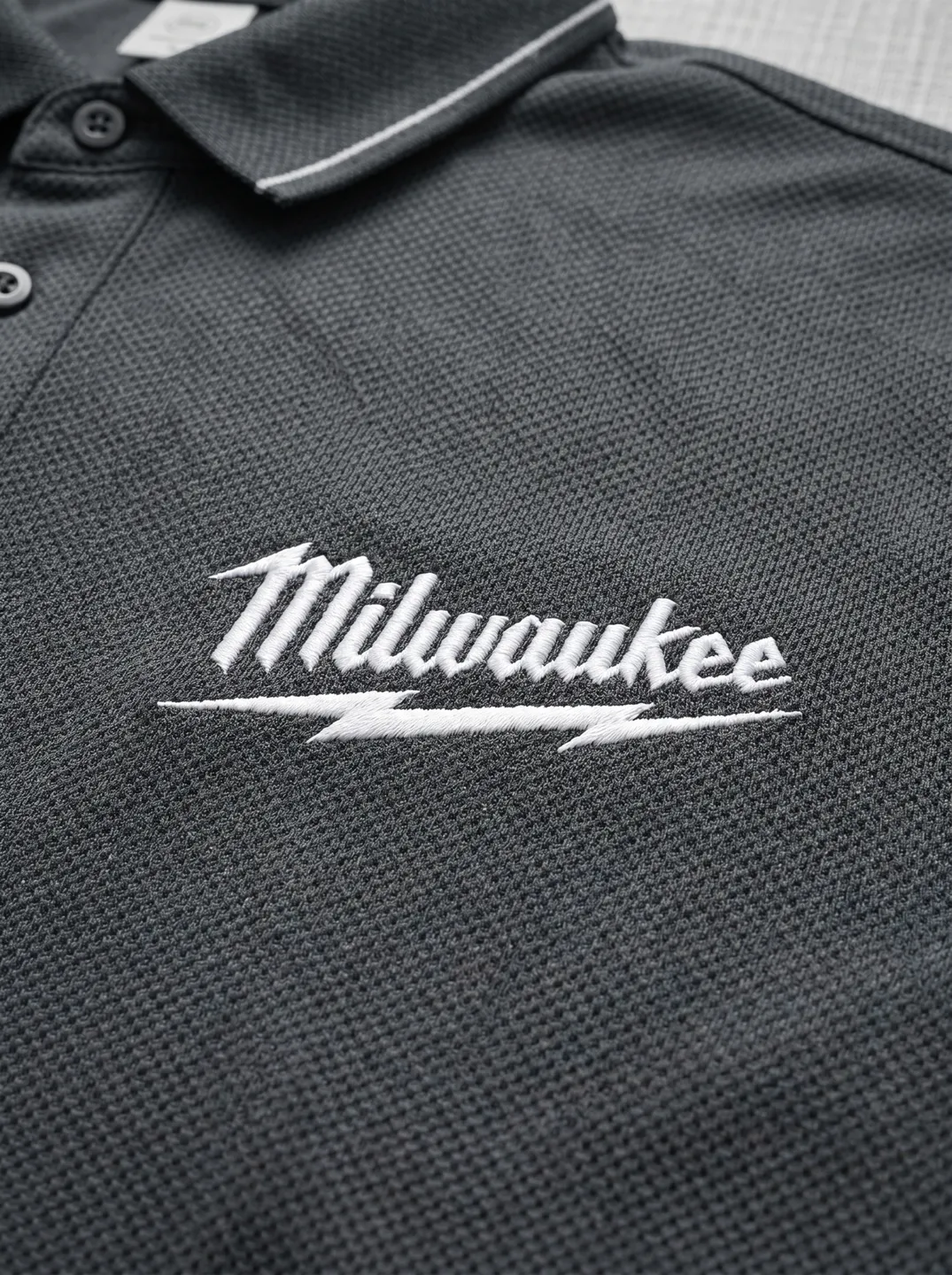 Charcoal Polo Shirt · Logo and design details · PM-C-093 / 2