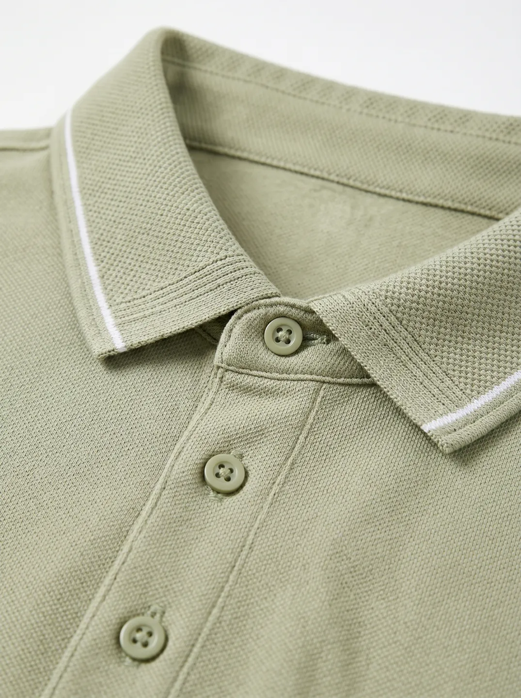 Poloshirt · Salbeigrün · Logo- und Designdetails · PM-C-111 / 3