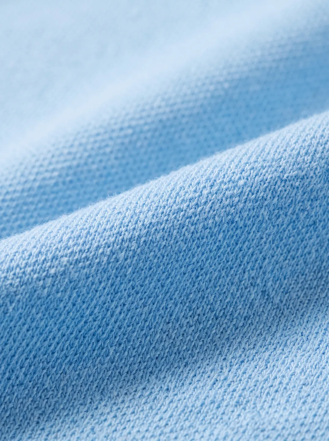 Light Blue Polo Shirt · Logo and design details · PM-C-129 / 5