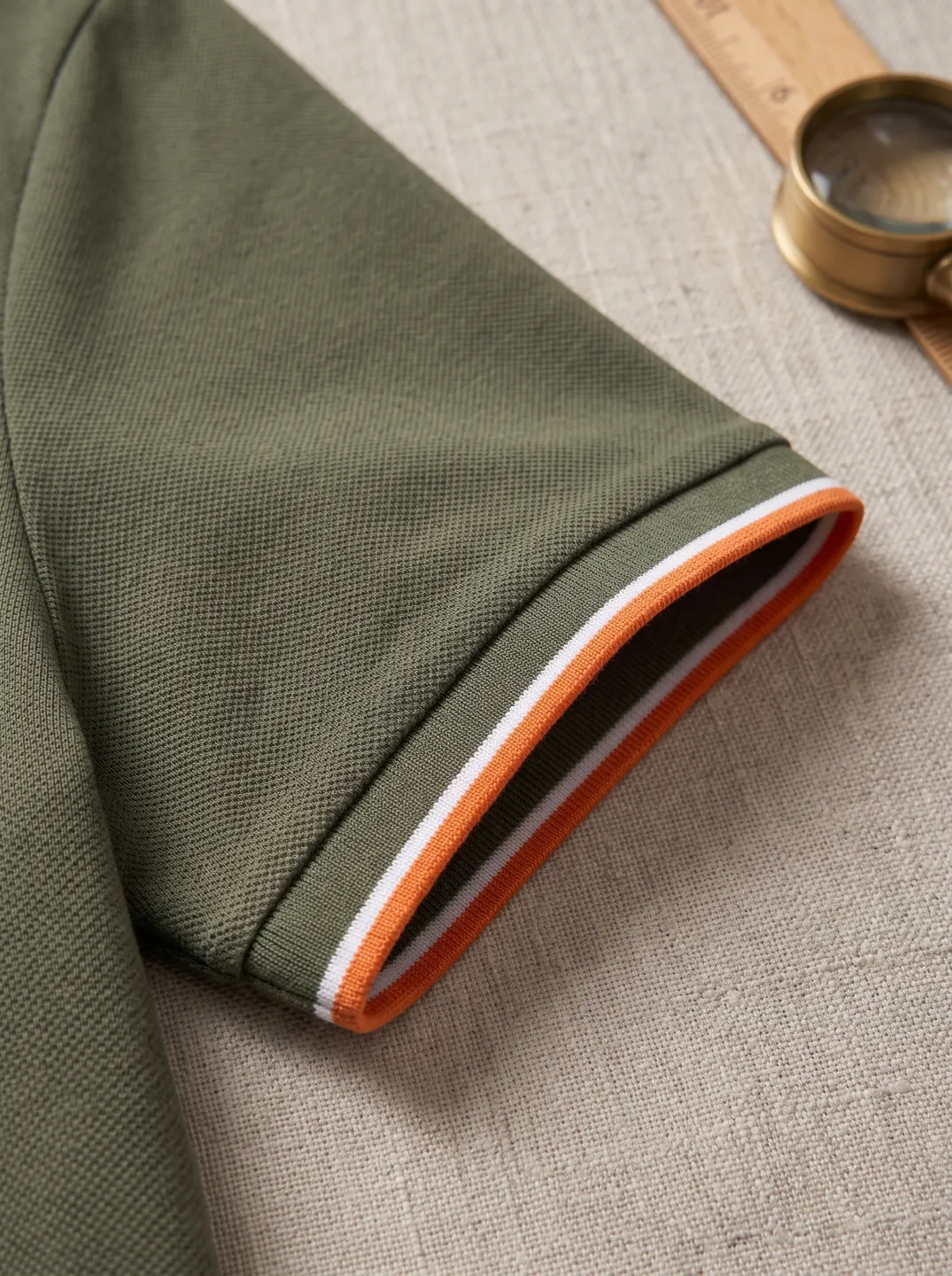 Olive Polo Shirt · Logo and design details · PM-C-131 / 4