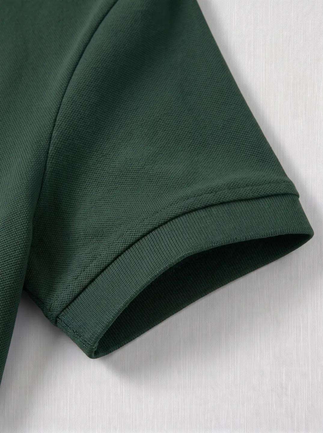 Deep Green Polo Shirt · Logo and design details · PM-C-140 / 4