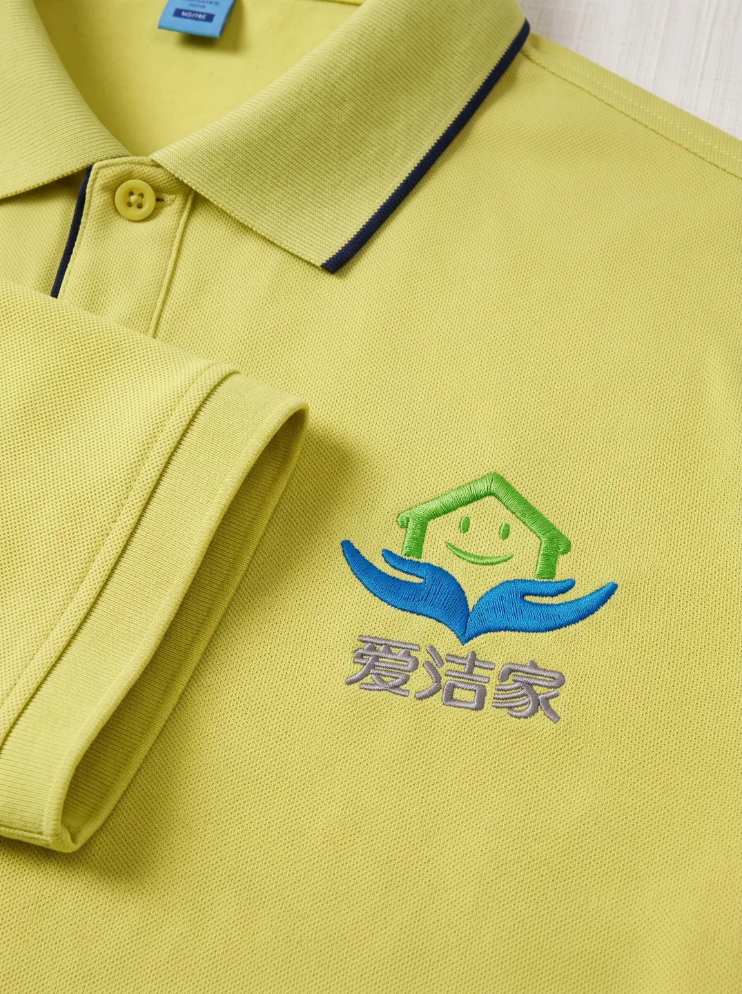 Yellow Zip-Neck Polo Shirt · Logo and design details · PM-C-145 / 3