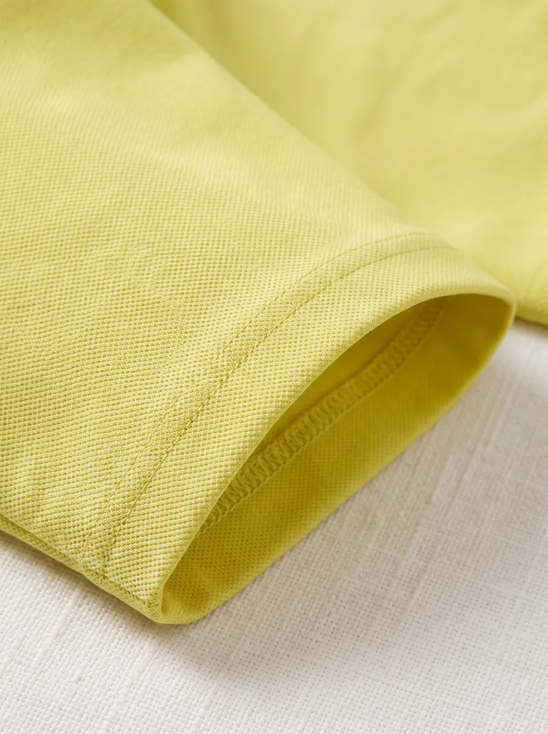Yellow Zip-Neck Polo Shirt · Logo and design details · PM-C-145 / 4