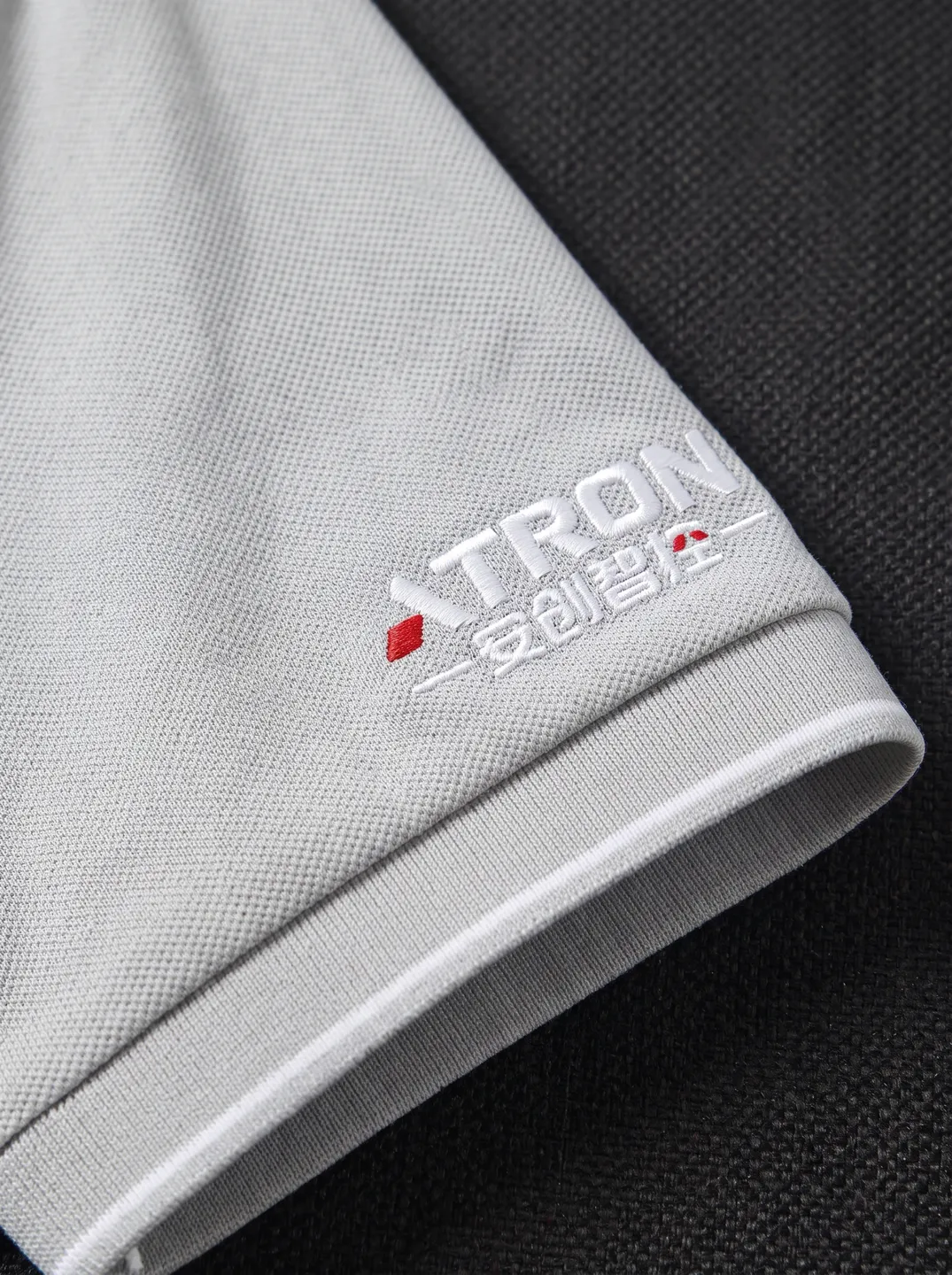 Light Grey Polo Shirt · Logo and design details · PM-C-146 / 4