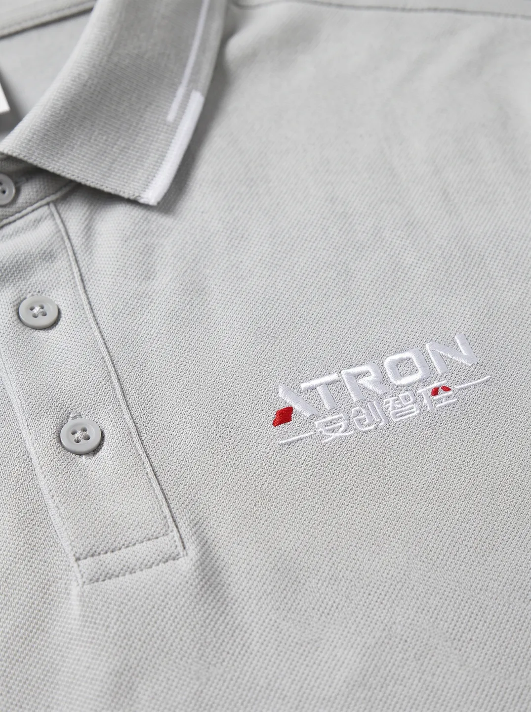 Light Grey Polo Shirt · Logo and design details · PM-C-146 / 3