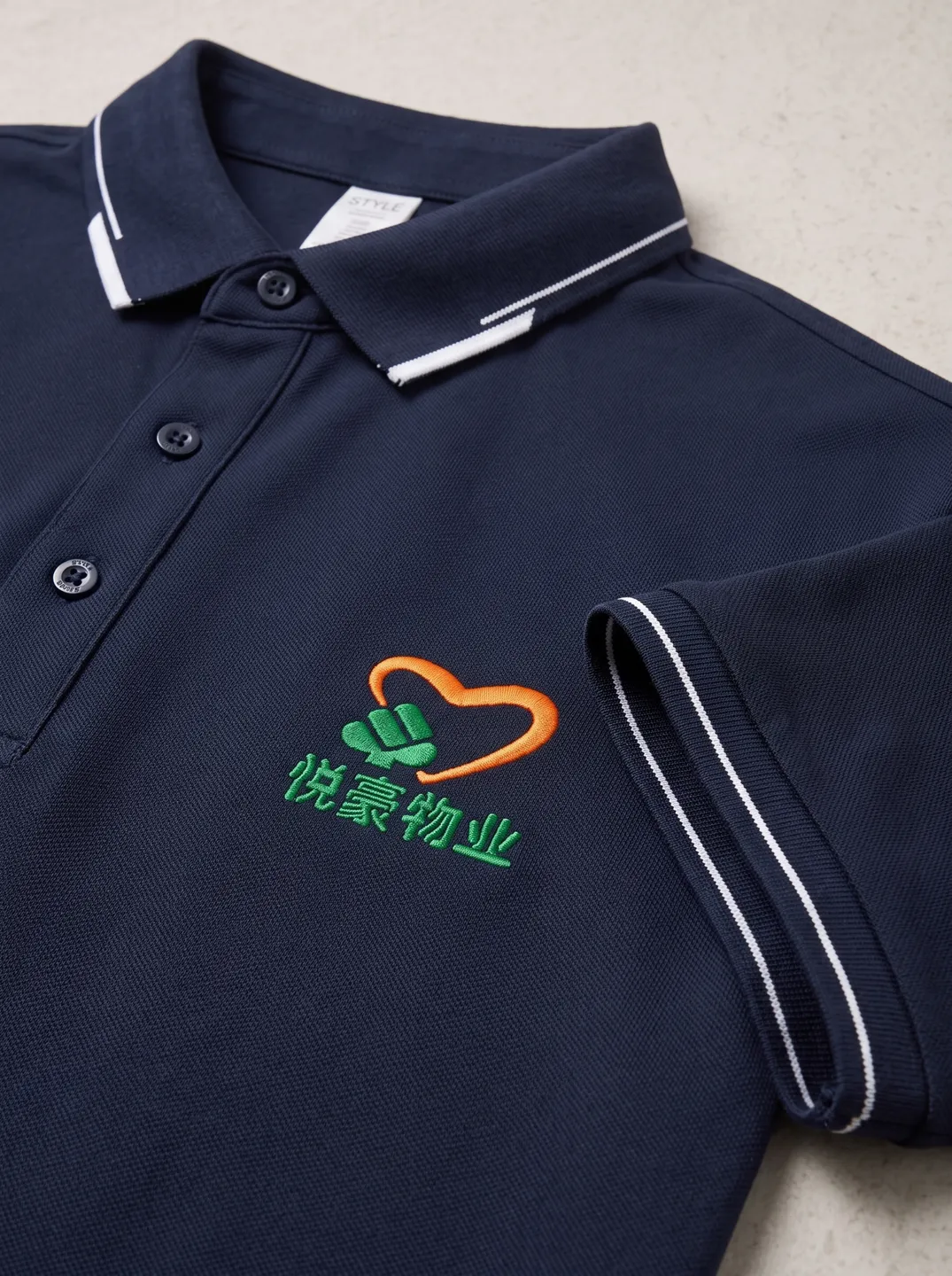 Navy Polo Shirt · Logo and design details · PM-C-147 / 3