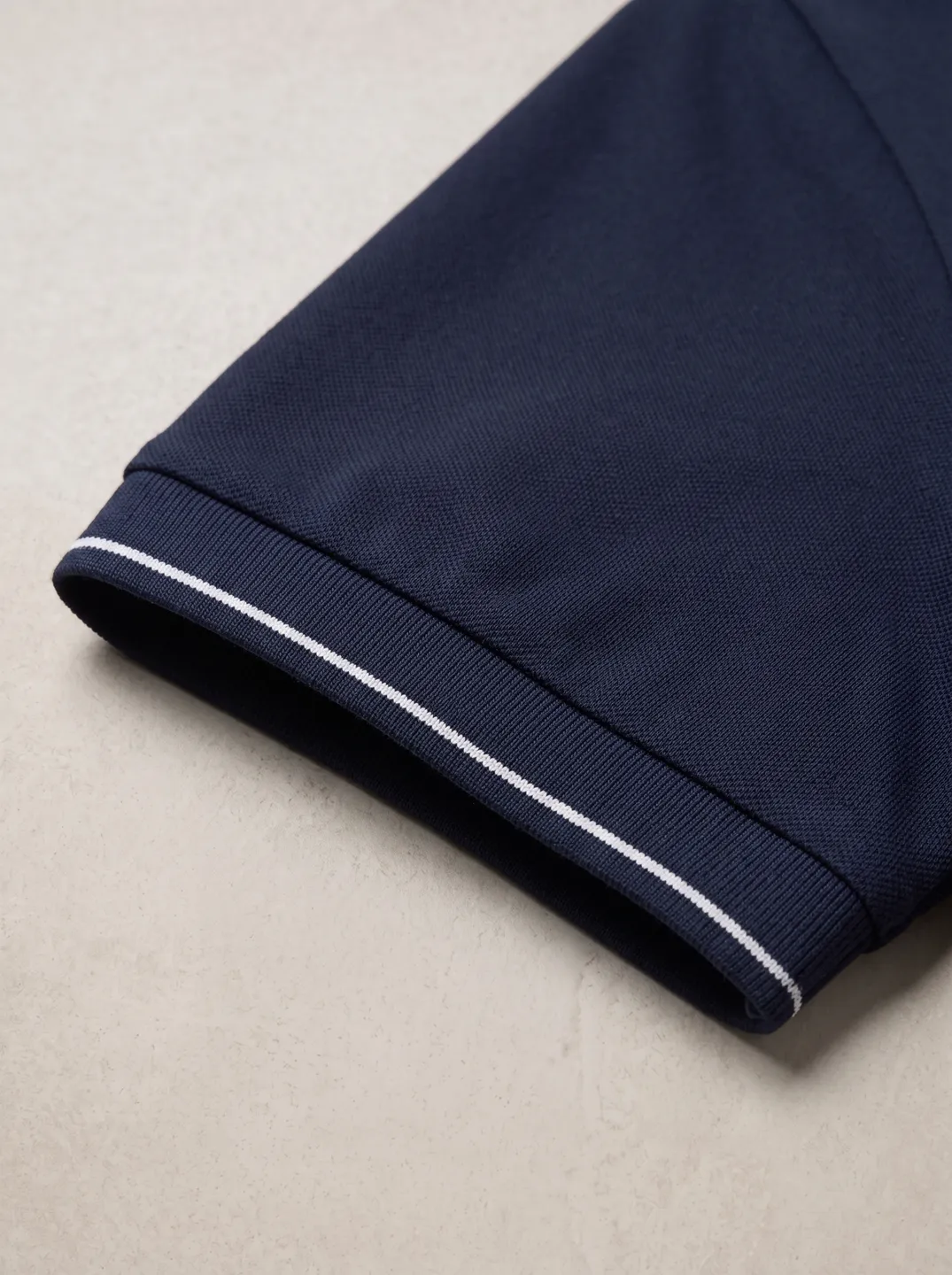 Navy Polo Shirt · Logo and design details · PM-C-147 / 4