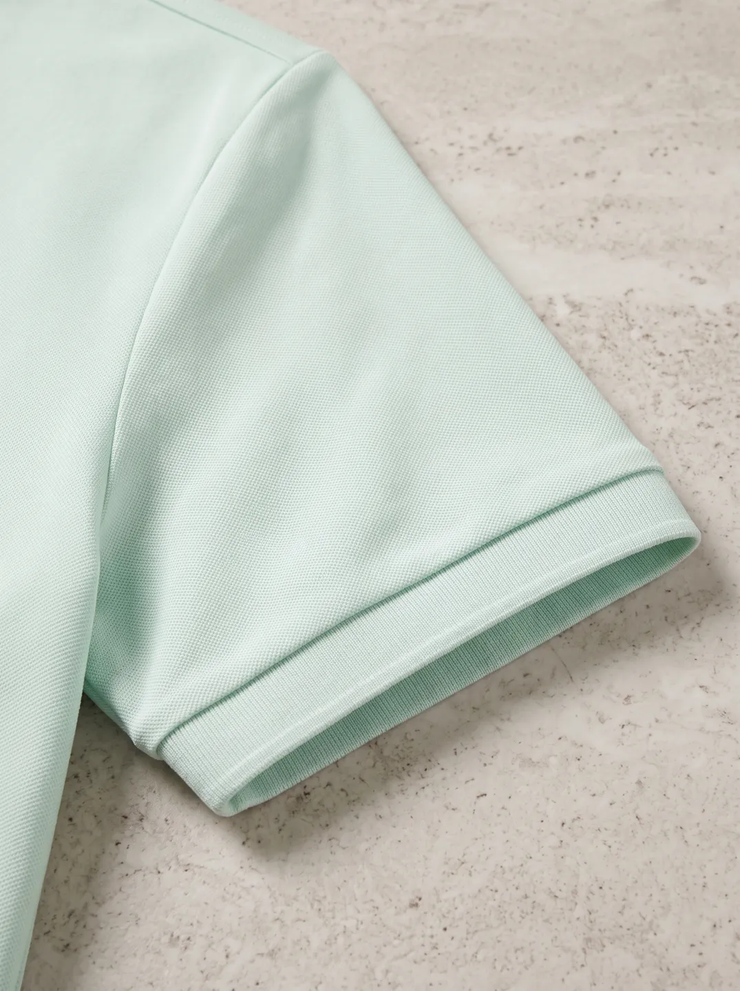 Mint Polo Shirt · Logo and design details · PM-C-149 / 4