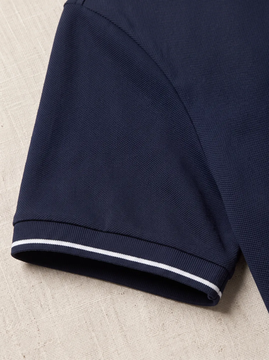 Navy Polo Shirt · Logo and design details · PM-C-152 / 4