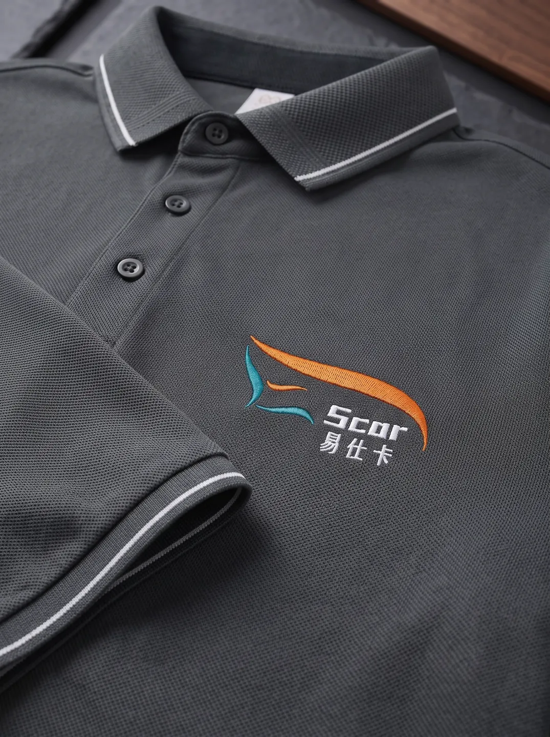 Charcoal Polo Shirt · Logo and design details · PM-C-154 / 3