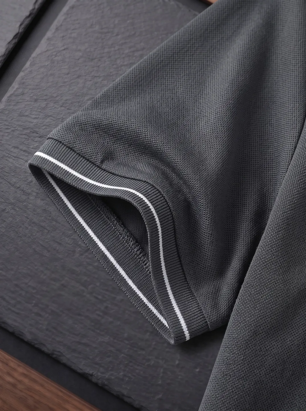 Charcoal Polo Shirt · Logo and design details · PM-C-154 / 4