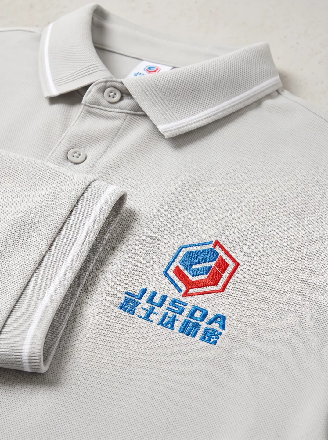 Light Grey Polo Shirt · Logo and design details · PM-C-157 / 3