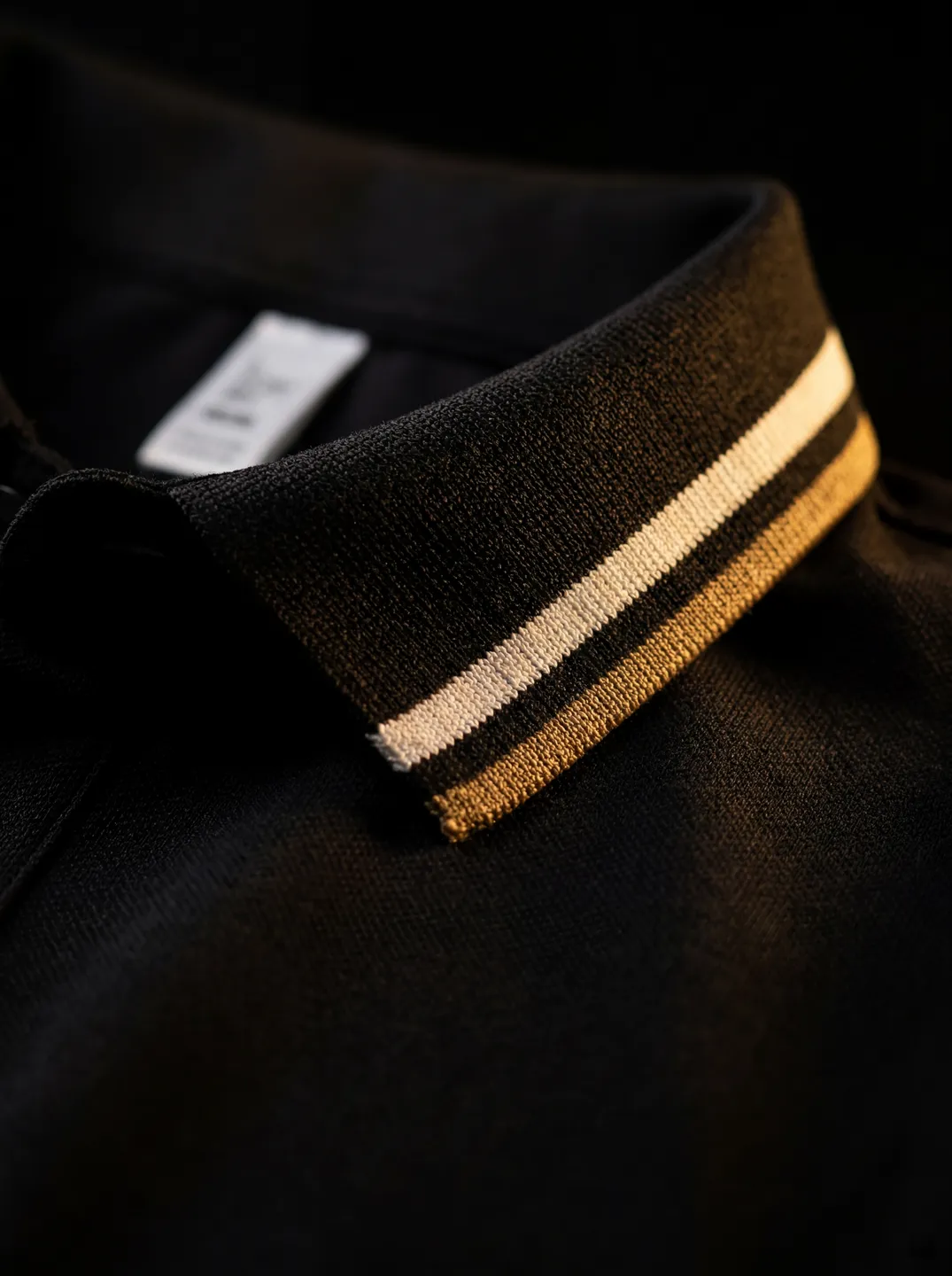 Black Polo Shirt · Logo and design details · PM-C-161 / 4