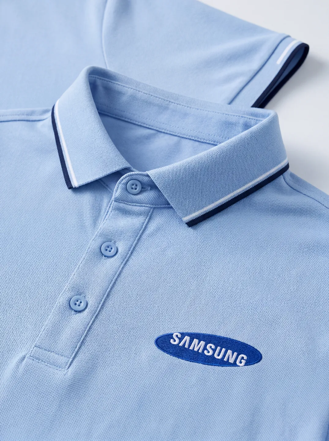 Light Blue Polo Shirt · Logo and design details · PM-C-166 / 3