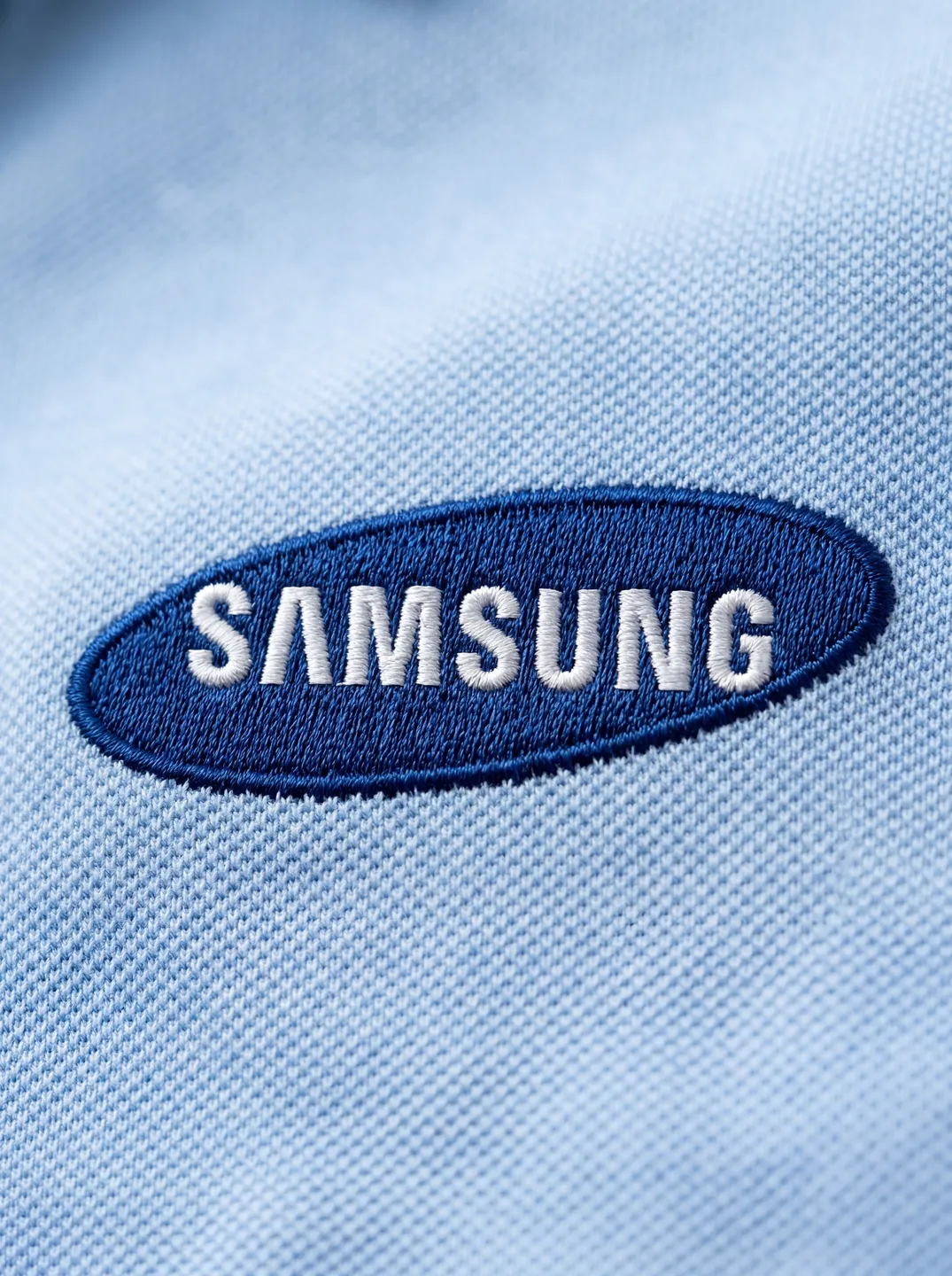 Light Blue Polo Shirt · Logo and design details · PM-C-166 / 2
