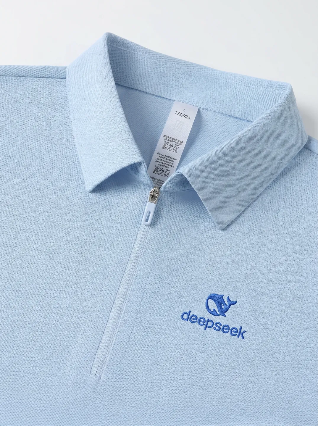 Light Blue Zip-Neck Polo Shirt · Logo and design details · PM-C-202 / 3