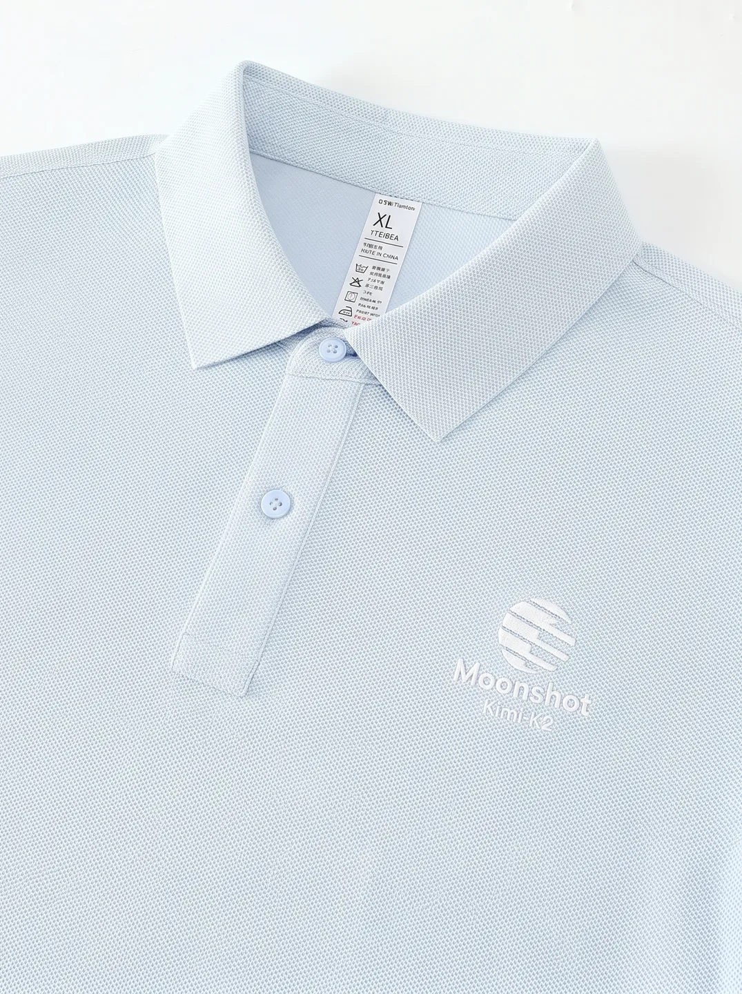Light Blue Polo Shirt · Logo and design details · PM-C-209 / 3
